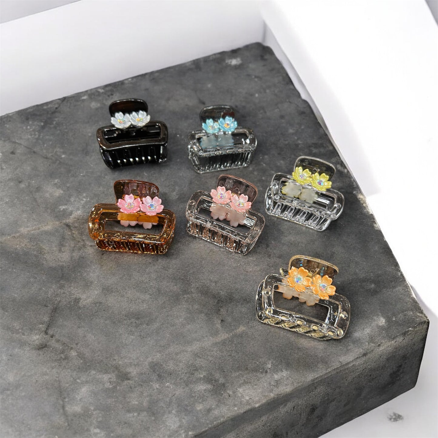 Premium heavy quality clutcher with mini flower( pack of 12)