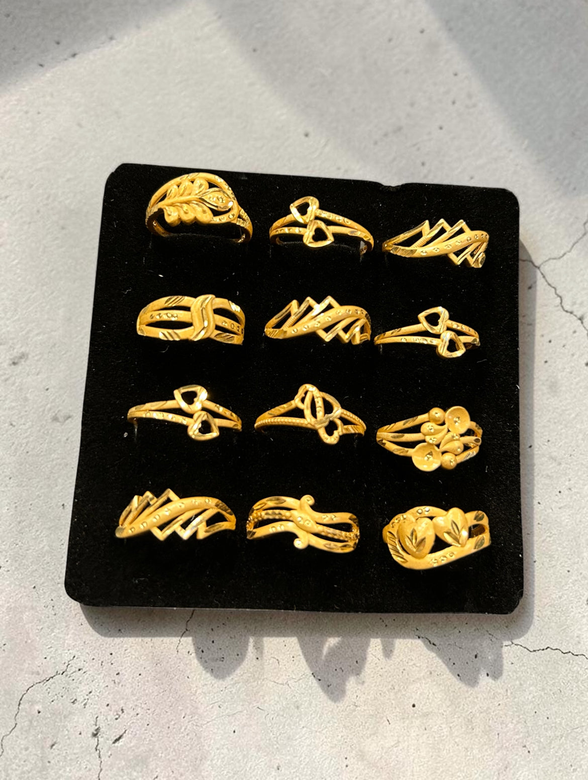 Premium 1 Gram Gold Polish Ruby & AD Stone Rings Set for Women – Elegant Designer Daily Wear Artificial Jewellery(pack of 12)