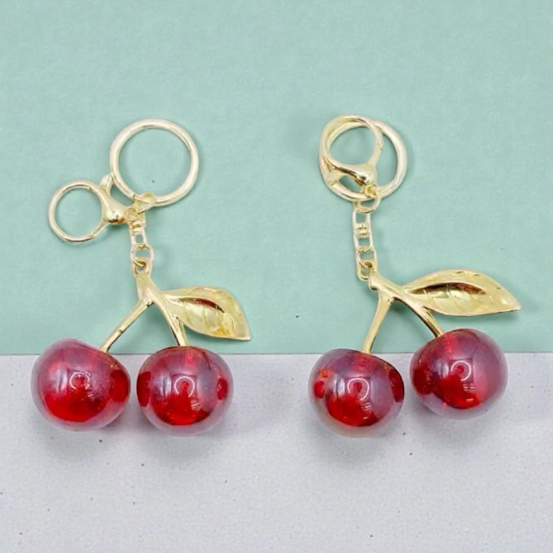 Cute Cherry Charm Keychain – Glossy Fruit Design (Wholesale)
(Pack of 12)
