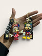 Cute Cartoon Couple Keychain – Glossy Finish Character Keyring with Strap ( pack of 12)