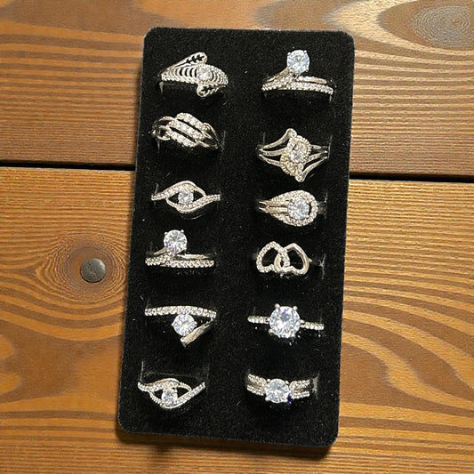 Silver Finish Crystal Adjustable Rings Set – Elegant Solitaire & Designer Assorted Collection
( pack of 12)