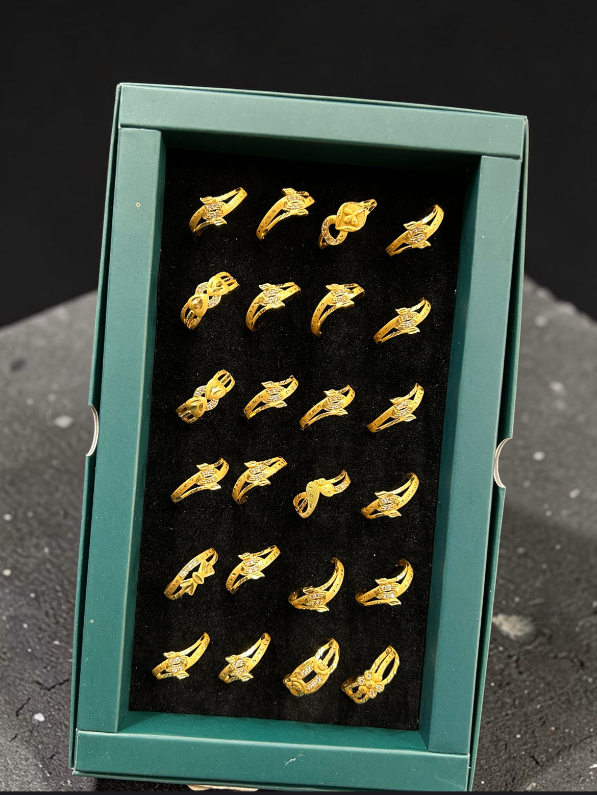 Elegant 1 Gram Gold Polish Rings Set for Women – Designer Daily Wear Artificial Jewellery Combo (pack of 24)