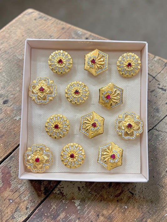 Premium 1 Gram Gold Polish Floral & Geometric Ruby Stone Rings Set for Women – Designer Artificial Jewellery Collection(pack of 12)