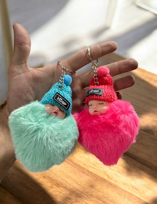 Sleeping Baby Fluffy Doll Keychain – Cute Fur Pom Pom Bag Charm ( pack of 12)