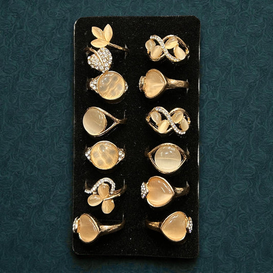 Gold Plated Opal Stone Adjustable Rings Set – Elegant Designer Assorted Collection
( pack of 12)