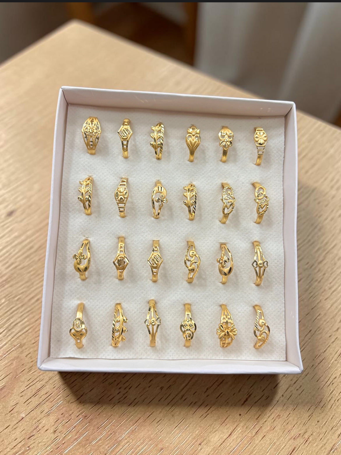 Elegant 1 Gram Gold Polish Minimal Rings Set for Women – Lightweight Daily Wear Artificial Jewellery Collection(pack of 24)