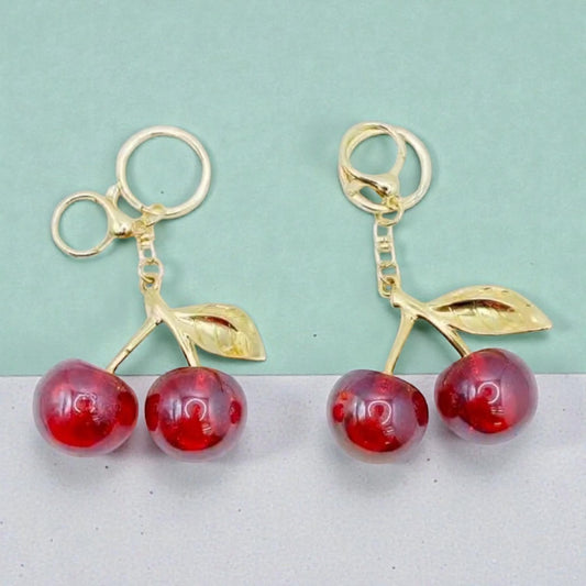 Cute Cherry Charm Keychain – Glossy Fruit Design (Wholesale)
(Pack of 12)