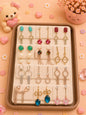 Korean chic earrings with a foldable box ( pack of 12 pieces)