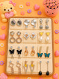 Korean chic earrings with a foldable box ( pack of 12 pieces)