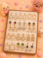 Korean chic earrings with a foldable box ( pack of 12 pieces)