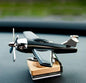 Solar powered plane stand with fragrance