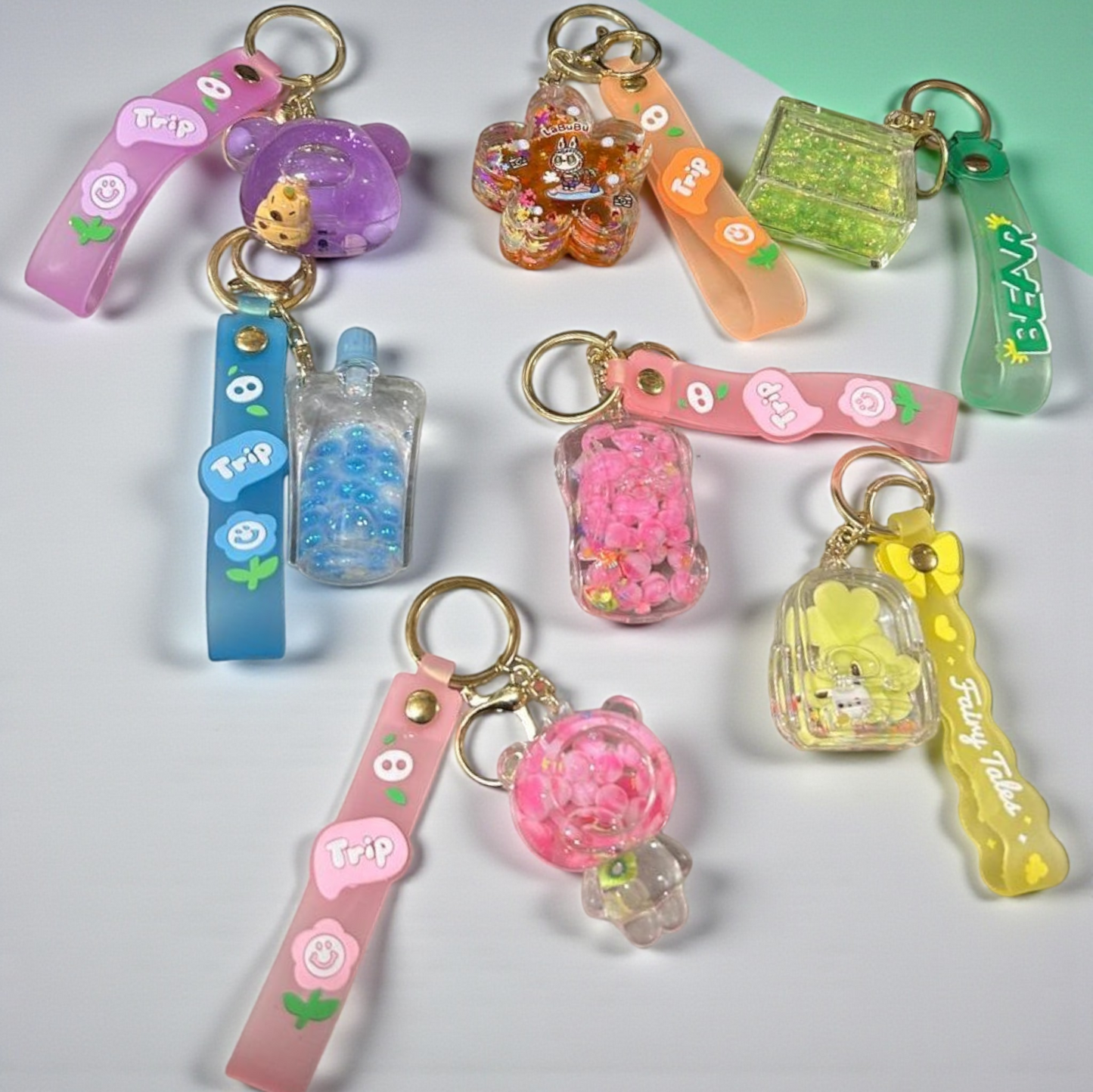 Kawaii Jelly Charm Keychains – Cute Liquid Shaker Keyring Collection( pack of 12) mix random design